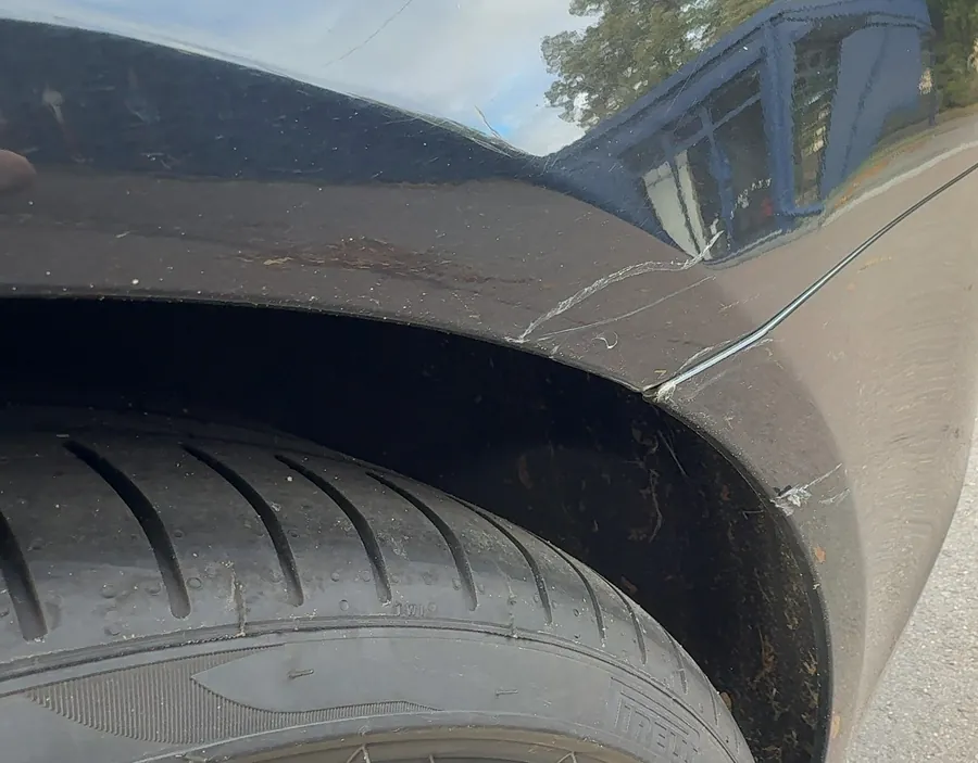 Schadenbild: BMW 7er, Schaden hinten links (BMW 7er)
